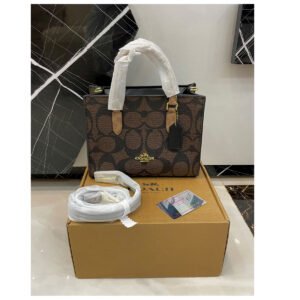 Coach Small Town Bucket Bag in Signature Dark Brown Coated Canvas - Brown
