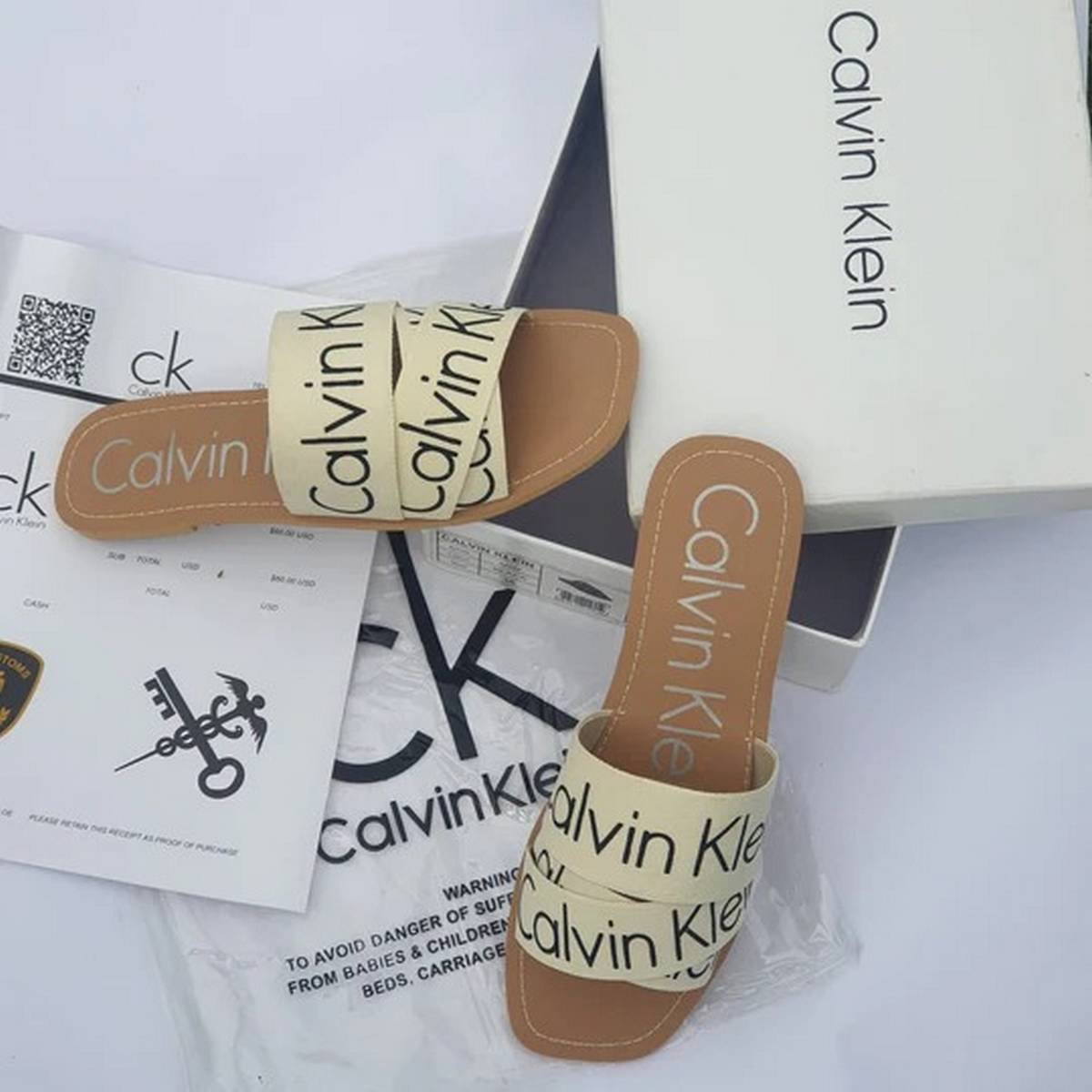 Calvin Klein Criss-Cross Logo Slide Sandals – Cream / Beige - Image 2